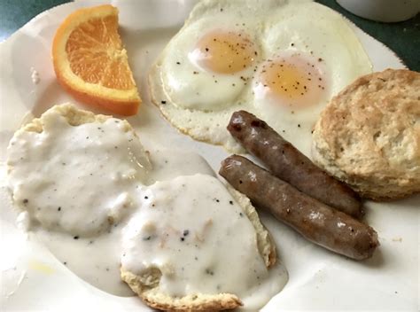 [Homemade] Buttermilk biscuits, gravy, eggs, Sausage, Useless fruit slice : r/food