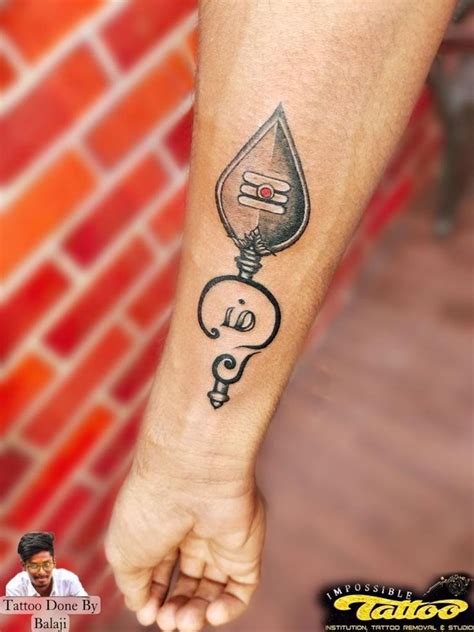 Murugan vel tattoo | Band tattoo designs, Name tattoo on hand, Murugan vel tattoo design