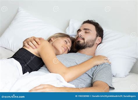 Young Cute Couple Hug and Sleep Together in Bed Stock Photo - Image of ...