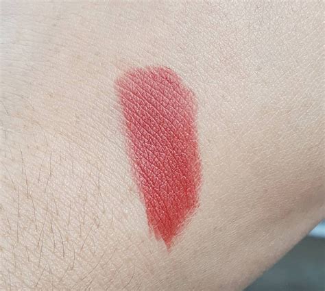 Random Beauty by Hollie: Mac Powder Kiss Lipstick in Devoted to Chili Swatch