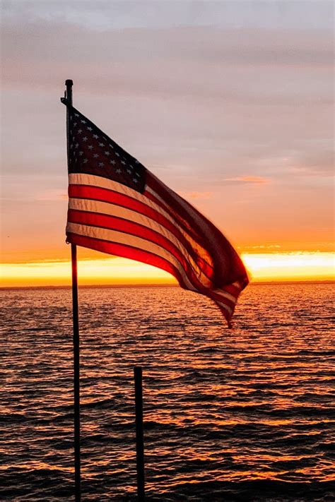 American Flag at Sunset | Sunset, American flag, Lake life