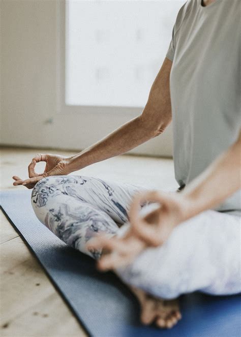 Fitness woman in a Sukhasana | Photo - rawpixel