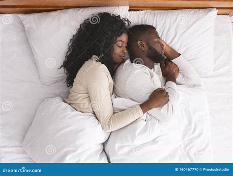 Romantic Black Couple Hugging while Sleeping in Bed Stock Photo - Image ...