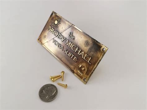 "A personalized solid brass plaque with an antique look to be attached on outdoor or indoor ...