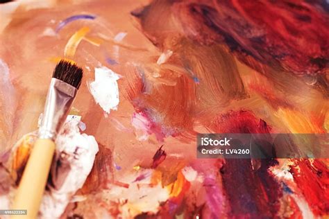 Mixing Oil Colors On A Paint Pallet Stock Photo - Download Image Now ...