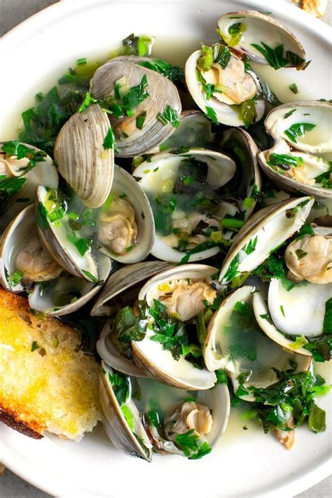 Spicy Clams With Garlicky Toasts Recipe | Recipe | Recipes, Steamed clams, Nyt cooking