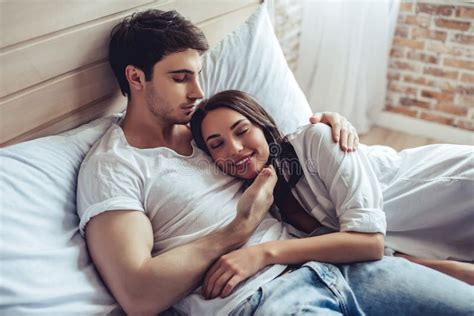 Couple in bedroom stock photo. Image of lovers, male - 107379160