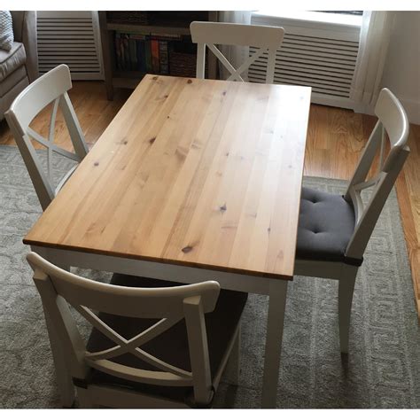 Ikea Lerhamn White/Natural Wood Table & 4 Chairs w/ Cushions - AptDeco