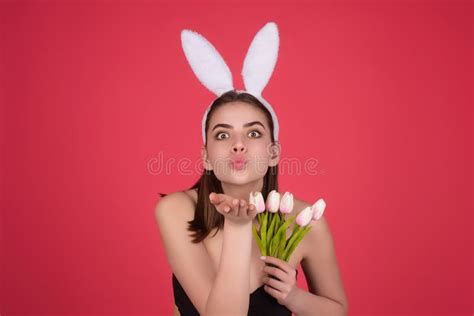 Easter Girl. Young Woman with Bunny Ears and Easter Eggs on Studio Background Stock Photo ...