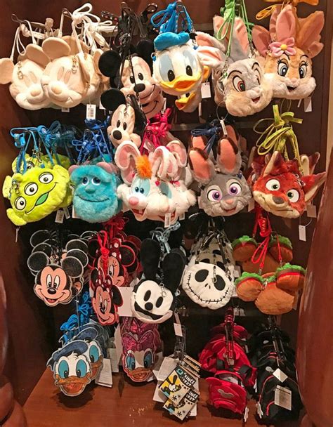 many disney mouse key chains are on display