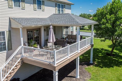 Covered porch with hip-style roof | Porch design, Covered deck designs, Patio roof