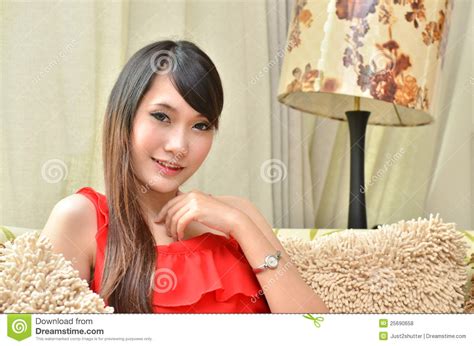 Beautiful Smiling Woman Sitting on Modern Sofa Stock Photo - Image of leisure, girl: 25690658