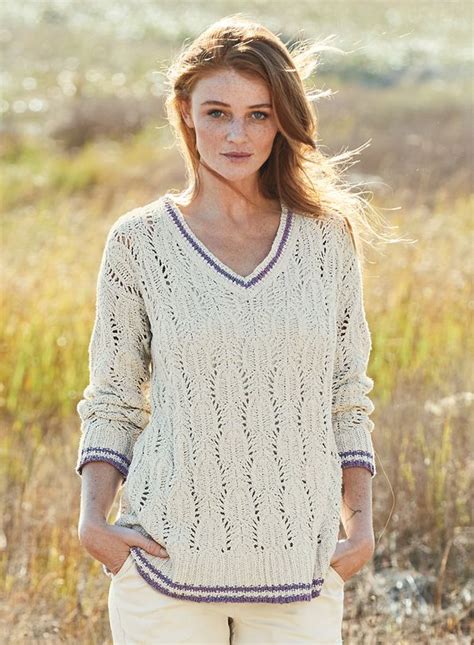 A feminine iteration of a classic cricket sweater, ours showcases a lacy leaf motif. Knit of ...