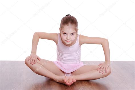 Little ballerina stretching Stock Photo by ©Mari1Photo 54952217