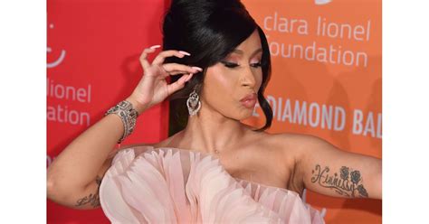 Cardi B's Hennessy Tattoo | The Meaning Behind Cardi B’s 10 Tattoos | POPSUGAR Beauty UK Photo 9