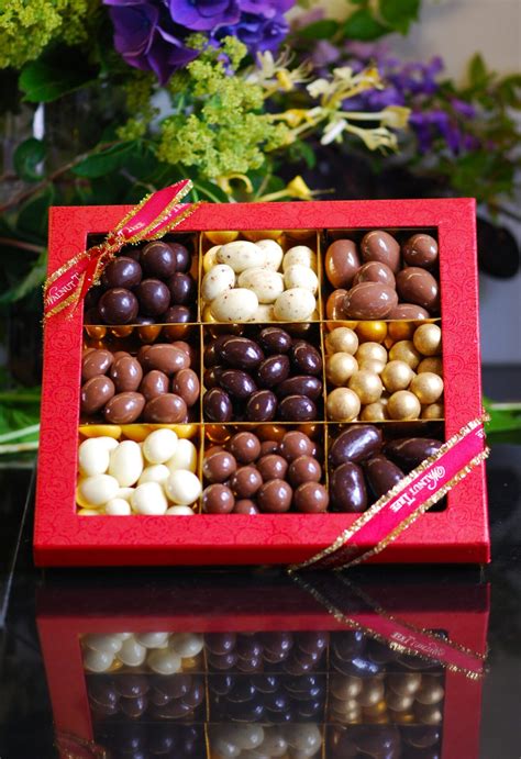 Chocolate covered nut box in milk, dark and white chocolate.