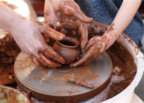 Hands Working on Pottery Wheel Stock Photo - Image of hand ...