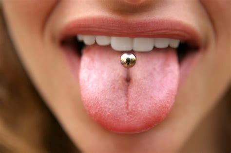 The Risks of Tongue Piercing: 10 Ways It Hurts Your Mouth & Teeth