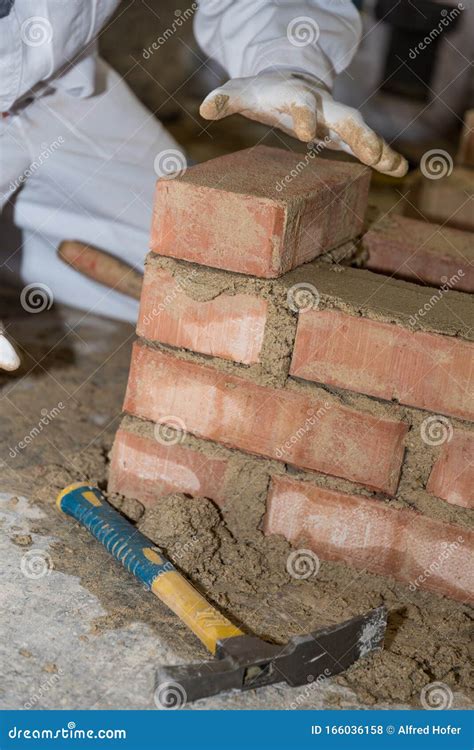 Mason Builds Brick Wall - Close-up Stock Photo - Image of bricklayer ...