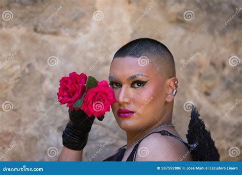 Portrait of a Young Non-binary Latin Person, Wearing Black Make-up and ...