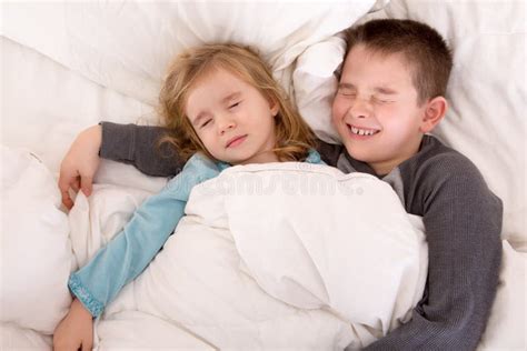 Two Cute Young Children Sleeping In Bed Stock Image - Image of siblings, resting: 36774647