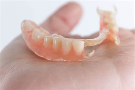 A Dental Bridge vs Dentures — Which Is Better?