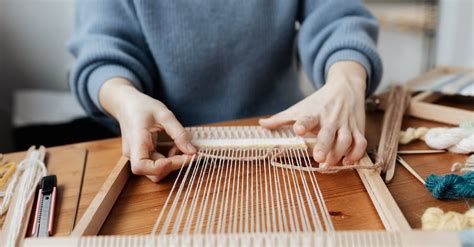 Person Weaving Using Hand Loom · Free Stock Photo