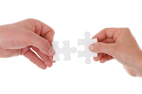 Hands Holding Jigsaw Free Stock Photo - Public Domain Pictures