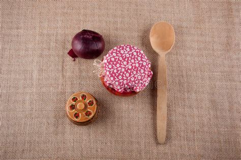 Red Onion, Wooden Box, Spoon and Jar on Sackcloth As Background. Stock ...