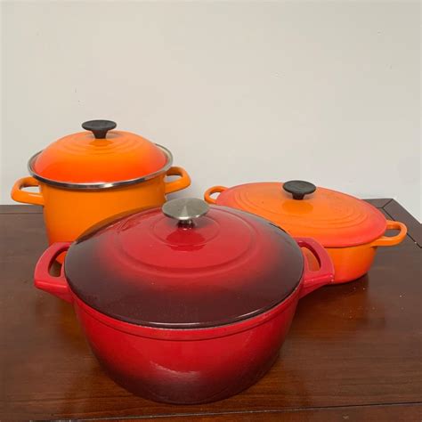 Le Creuset Enamel Cast Iron Pots (G - DG) | EstateSales.org