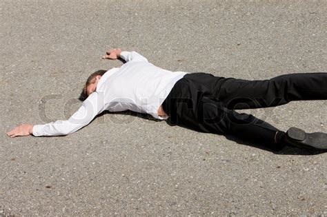 A dead man on the ground | Stock image | Colourbox