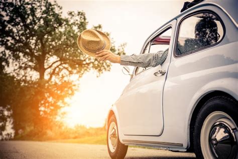 Premium Photo | Man driving vintage car