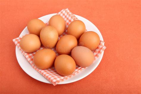 Brown Chicken Eggs on Vintage Tablecloth on White Plate Stock Photo - Image of groceries ...