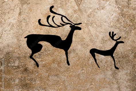 image of deer on the wall of the cave painted by an ancient man. history. archeology ...