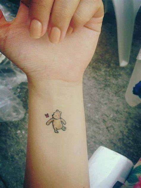 Small Winnie the Pooh tattoo | Disney tattoos, Bear tattoo designs ...