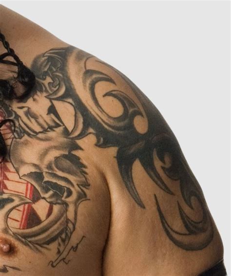 Umaga's 14 Tattoos & Their Meanings - Body Art Guru