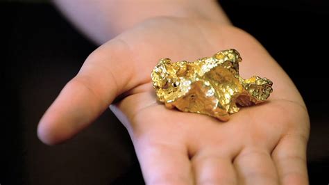 Real Gold Nugget Being Displayed On Hand To Stock Footage SBV-305287067 ...