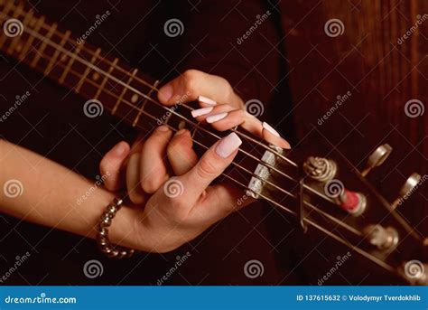 Instrumental Music Live. Couple in Love Play Duets. Male and Female Hands Play the Electric ...