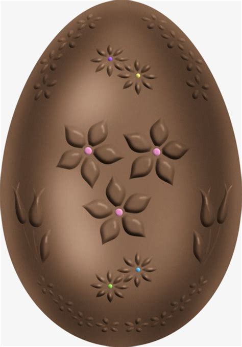 a chocolate easter egg decorated with flowers and leaves