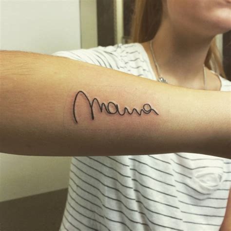 Forearm tattoo saying "Mama" by Sandra Veronika.