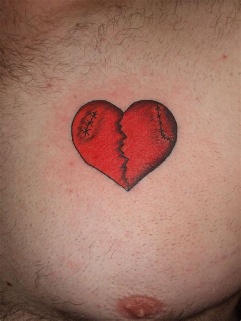 Red Broken Heart Tattoo On Chest | Tattoo Designs, Tattoo Pictures