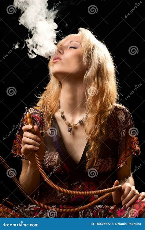 Woman smoking hookah. stock photo. Image of glamour, cute - 18039992