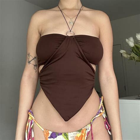 Brown two piece crop top with ring. For reference I... - Depop