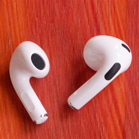 Apple AirPods (third-gen) review: new design, same appeal - The Verge