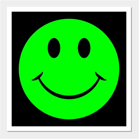 a green smiley face on a black background
