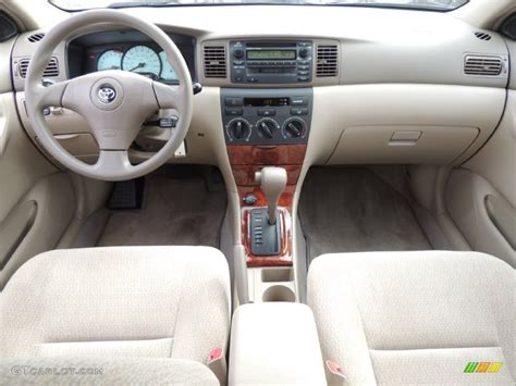 2004 Toyota Corolla LE Pebble Beige Dashboard Photo #77574060 ...