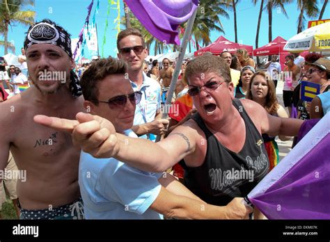 Miami Beach, Florida, USA. 11th April, 2015. People clash with members of Team Jesus Preachers ...