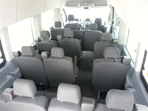 Huber's Auto Group - High Top Transit 15 Passenger Vans