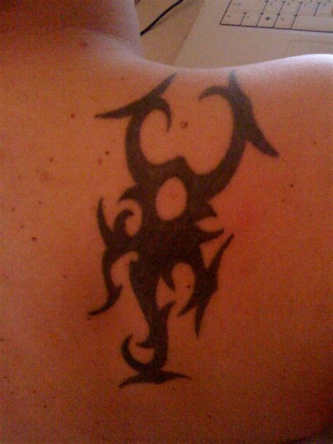 Maico - Borneo scorpion tattoo photo