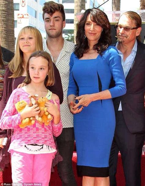 the family is posing on the hollywood walk of fame